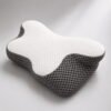 Left-angle view of the OrthoCloud Pillow with white honeycomb fabric and charcoal mesh