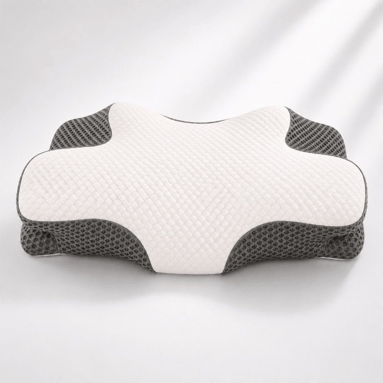 OrthoCloud ergonomic contour pillow in white fabric and charcoal breathable mesh
